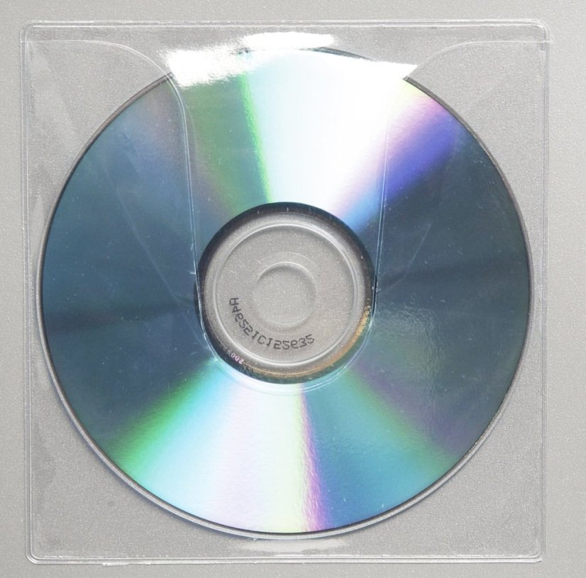 Samolepicí pouzdro na CD s klopou